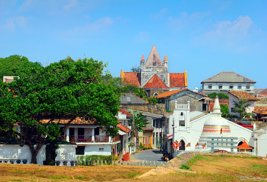 168713126_Beautiful scenery of ancient Dutch Galle Fort (UNESCO World Heritage Site) with Christian church and Buddhist stupa - view from fortification wall, southwest coast of Sri Lanka